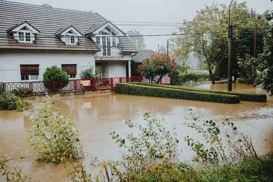 Fairfax County home surrounded by floodwaters requiring water damage restoration