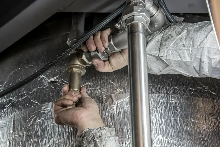 Plumbing repair following burst pipe water damage in a Fairfax VA residence