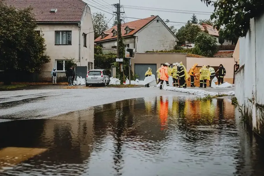 Water damage restoration crew managing floodwaters in a Fairfax VA suburb