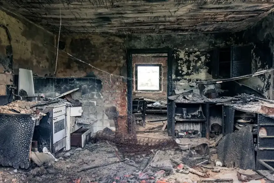 Fire-damaged kitchen in a Fairfax County home requiring smoke and soot remediation