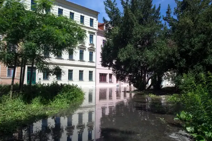 Floodwater on residential street requiring emergency restoration response in Fairfax VA